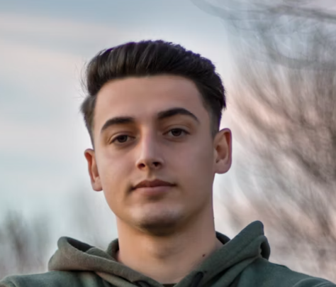 Young man in gray hoodie